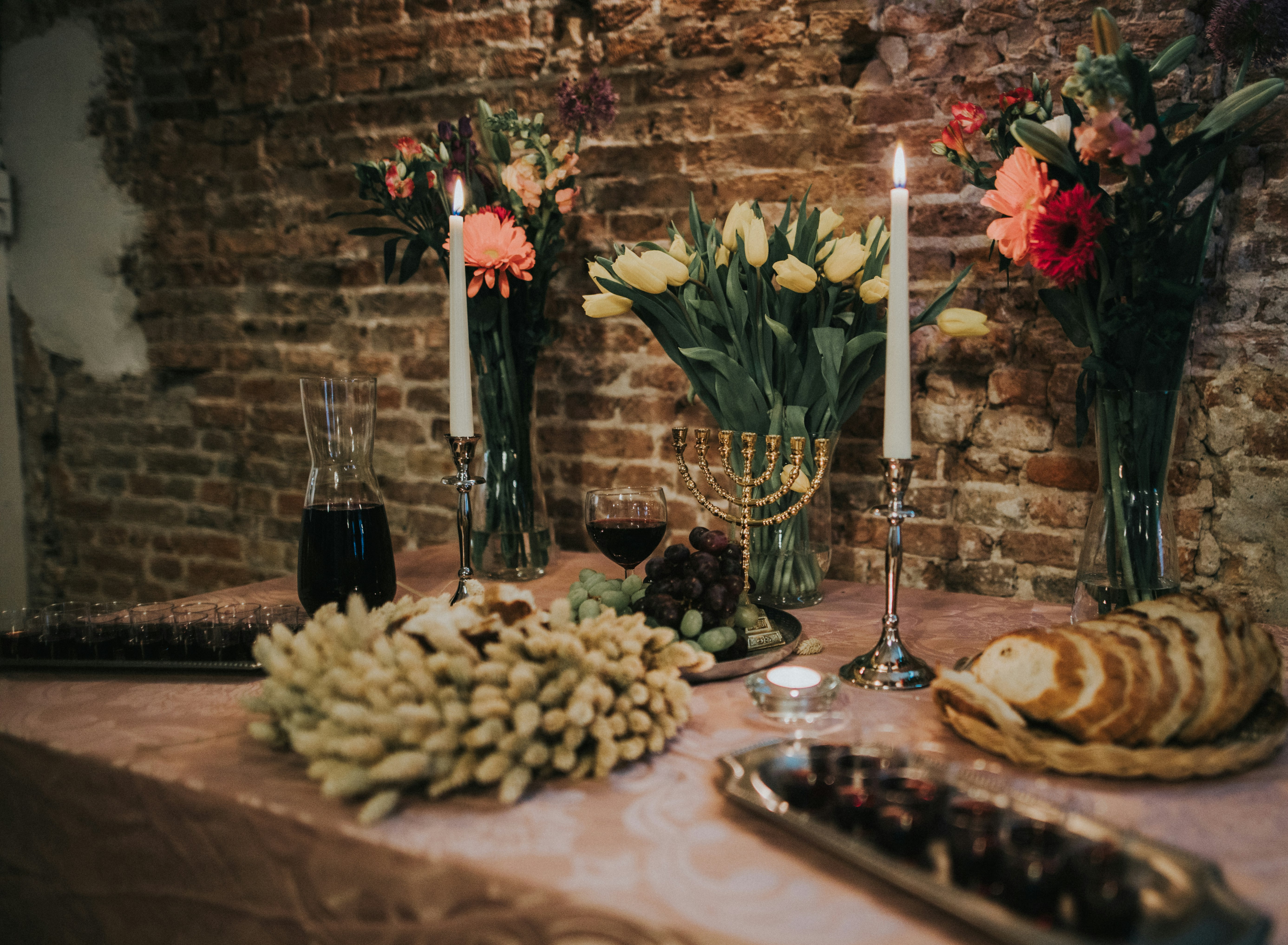 green and red flowers on table